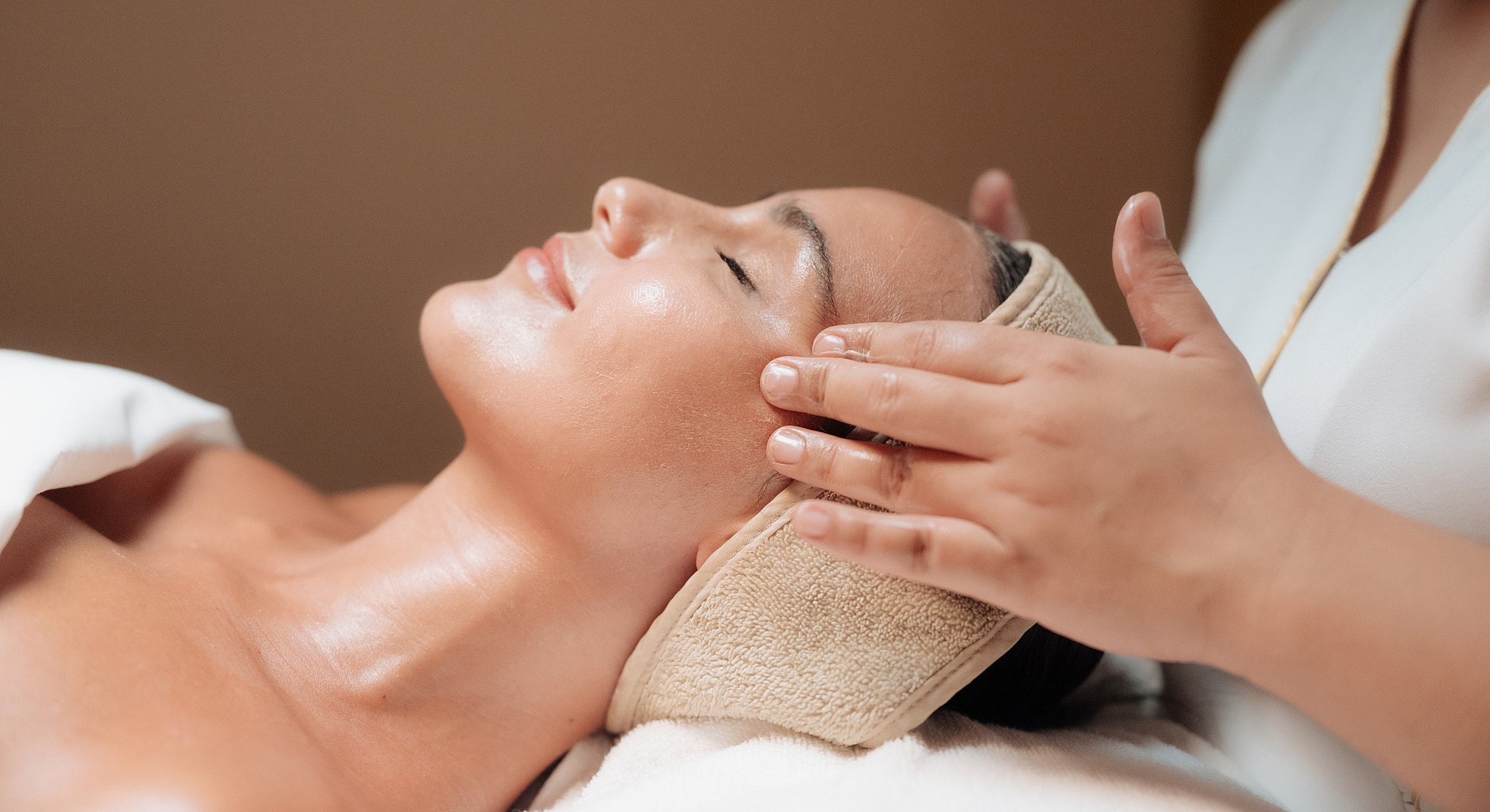Facial massage treatment in a spa setting.